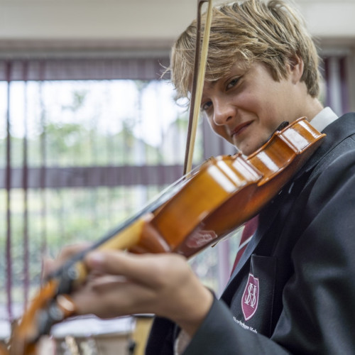 Student playing violin